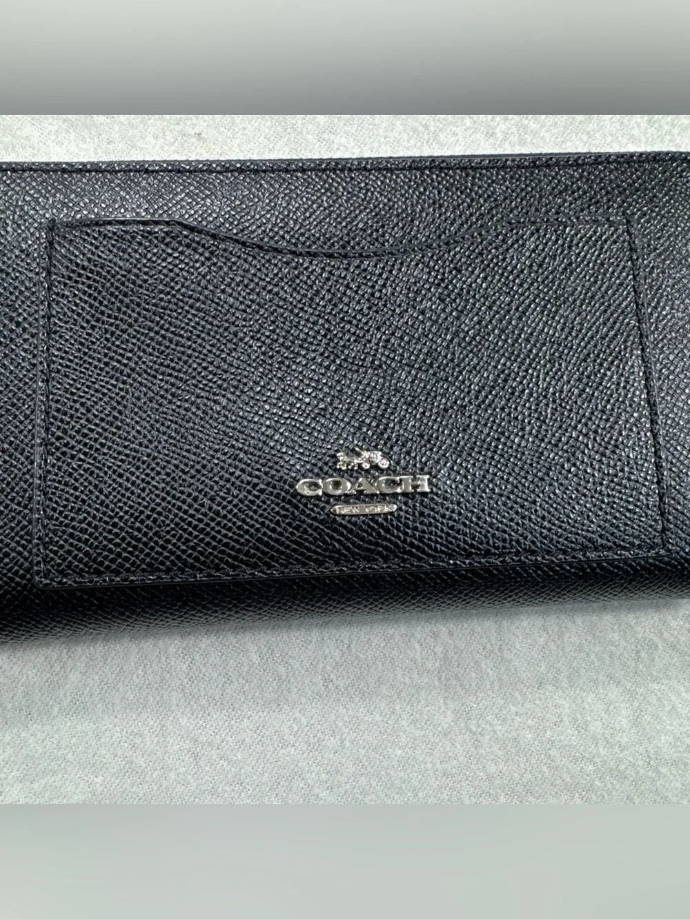 Coach sleek zip